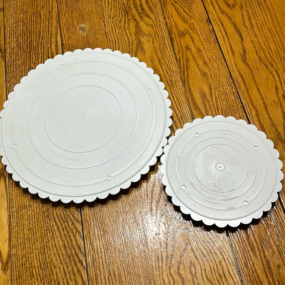 Wilton plastic decorators plates.  13” and 8”